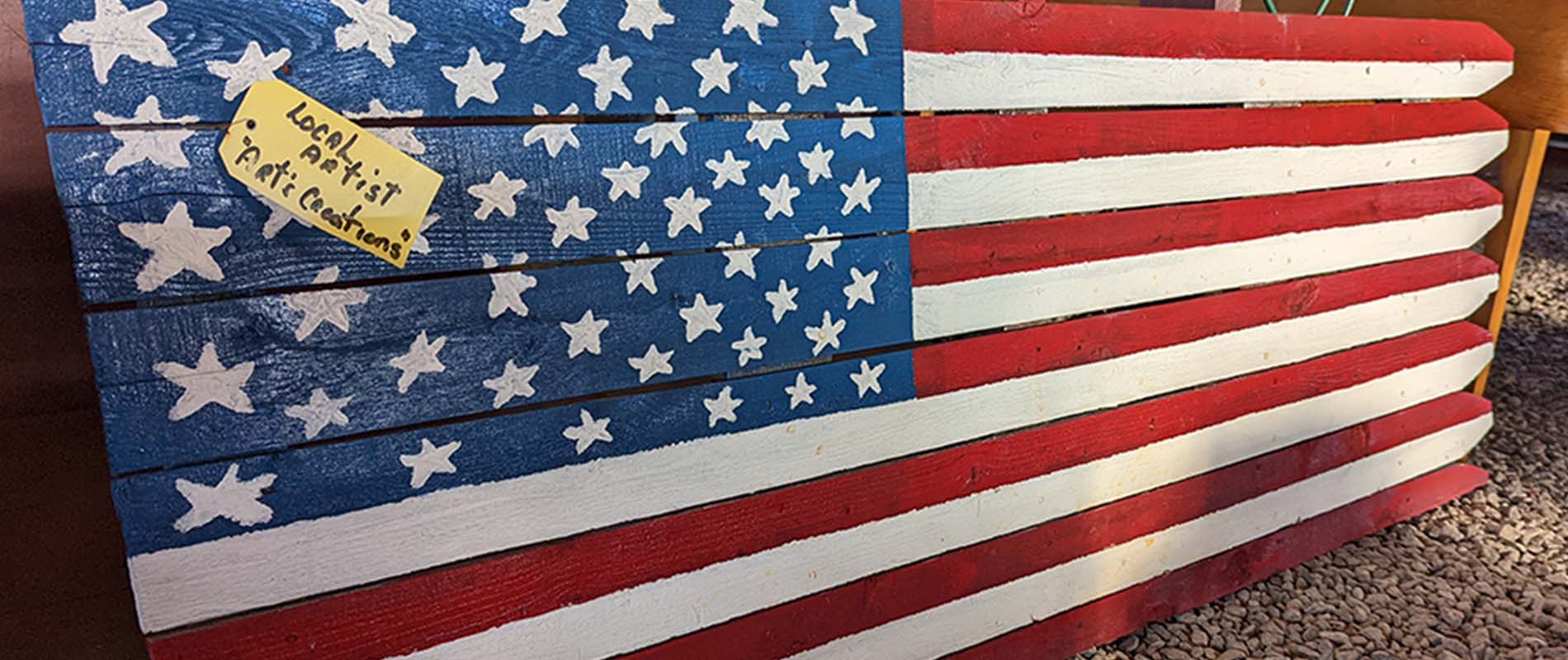 An antique wooden american flag